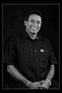 Portrait photo of the artist Raj Wickramasinghe